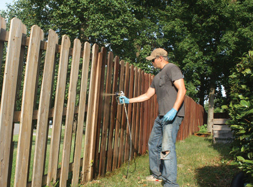 How do you stain a fence?