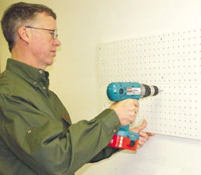 Companies such as Stringliner offer pegboard organizing systems to make smart use of wall space.