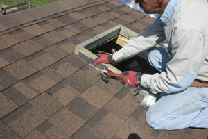 The next step is to flash the curb and shingles. This can be hand-cut flashing, or a flashing kit available from Sun-Tek. Flashing must be well sealed with sealant.