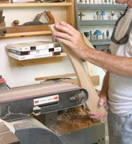 A drum or spindle sander is used to sand all curved surfaces.