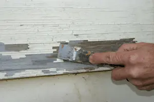 Scrape or remove any peeling, blistered or flaking paint caused by moisture. Then prime and repaint.