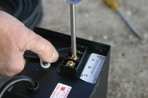 Fasten the low-voltage cable to the transformer.