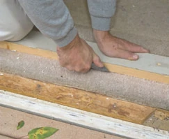 We used a straight-edge and utility knife to cut the carpet.