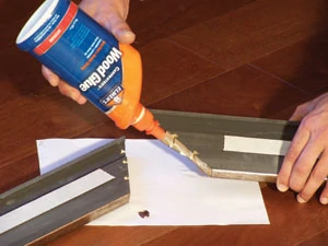 Apply wood glue to the miters.