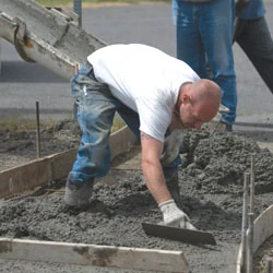 Fine grading, forming and pouring for exposed aggregate concrete is very similar to other finishing methods.