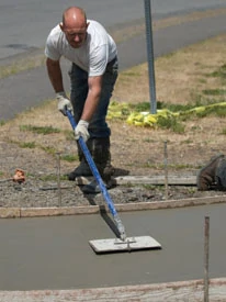 Shawn Joslin adds a joint line to his walkway project.