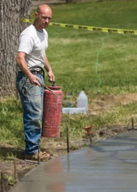 A spray can is the recommended tool for applying surface retarder.