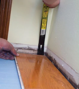 A flat bar can be used to pry the boards away from the wall to close the head joint gaps.