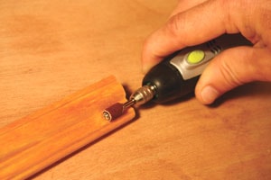 When fitted with small sanding drums, rotary tools can be used on craft projects and millwork, like window and door casings.