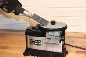 The Work Sharp system uses an abrasive pad on a glass wheel for sharpening all sorts of tools, from chisels and flat blades to lathe tools and scrapers.