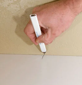 In most cases you will be fitting the laminate precisely to the walls, so it's a good idea to put some reference points on the plastic as well as on the wall, which aids getting the proper alignment when everything is glued.
