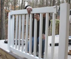 The top rail mounts over the balusters, followed by a rail cover for a comfortable hand grip.