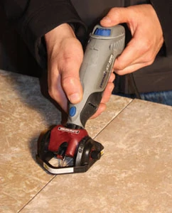 Grout-removal attachments enable a rotary tool to cut away old grout without damaging tile.