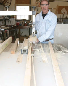 First step is to rip stock construction 2x4's into 1-5/8-inch widths to create the leg-posts.