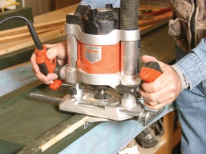 Using a plunge router, cut a 1/4 x 3/8-inch rabbet in the back inside edges of the leg posts stopping at the legs.