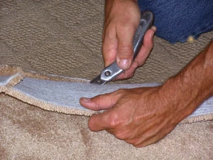 Trim away any excess with a carpet knife.