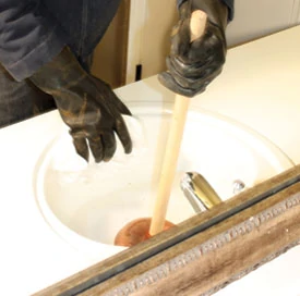 When plunging, use a wet rag to seal off the overflow drain to create a vacuum.
