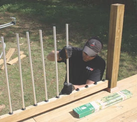 Slide the aluminum balusters onto the rubber baluster connectors.