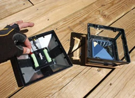 Activate the Solar Post Lights by removing the plastic tab from the battery terminal.