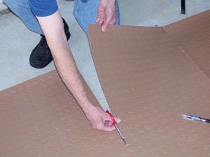 Trim the covering with a utility knife or scissors.