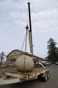 Our neighbor, Mel Ashland, hires a large crane for about$150 an hour whenever he wants to move large rocks, some of which were “flown” right over his house.