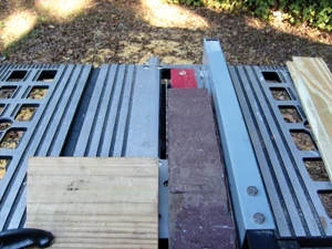 One of the old boards was used as a guide to determine the width of the replacement boards.