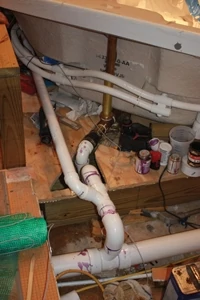 Shown here is the bathroom plumbing integrated into the elevated platform.