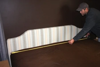First step to installing the headboard is to determine its midpoint.