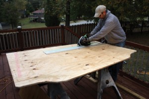 head9 A circular saw with a straight-edge guide is an accurate system for trimming the frame to its desired height.