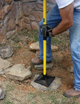 It helps to tamp the stone into the soil and add backfill to help hold them stationary.