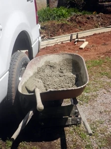 The concrete for this project was mixed one bag at a time in a wheelbarrow.