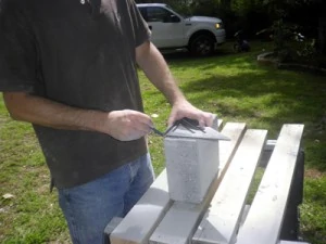 Some of the cap blocks had to be cut, which were marked with a Speed Square.