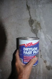 Cracks and holes can be patched using a fast-setting hydraulic cement.