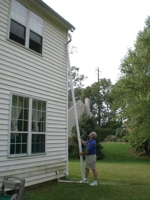 Water accumulation against the foundation wall can seep into the basement. Clogged gutters and downspouts are often the problem. Products like The Spout-Off make it easy to clean downspouts from the ground.