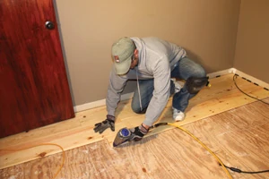 Proceed from row to row, nailing the tongues of the boards into the subfloor at a 45-degree angle. Stagger each end joint by at least 18 inches.