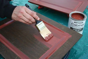 Paint the cabinet surface with the colored bond coat.