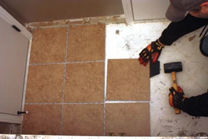 The SnapStone floating tile floor requires no mortar to adhere it in place. The interlocking edges can be joined with a hammer and rubber block, similar to installing laminate floor boards.