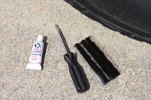 Tire-patch kits are available at almost any gas station for a modest price and include the basic tools and materials to get the job done.