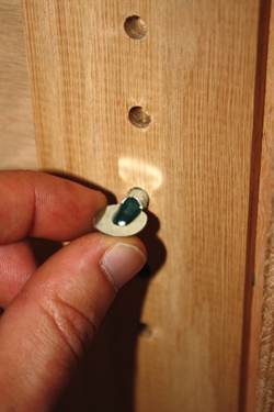 Shelves are held with 1/4" spoon-style pins.