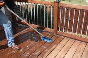 Scrub the deck surface
