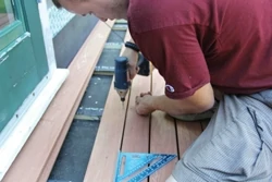 The mahogany deck boards were installed with stainless steel screws and spaced 1/4" apart.