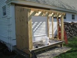 The walls as well as the roof received ½-in. CDX plywood sheathing. 