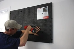 The interlocking pegboard panels self-align during installation, so after plumbing the first one you can complete the job without using a hand level. 