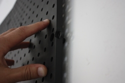 Since the panels stand off the wall, tool hooks can easily be installed without the need for slats at the ear of the pegboard. 
