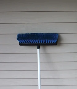 Cleaning a home’s siding can brighten the color tone by several shades.