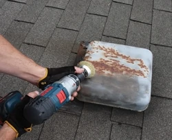 Rust on metal roof accessories can be removed with a wire brush—handheld or drill-mounted. Lay on some fresh primer and paint to renew their appearance. 