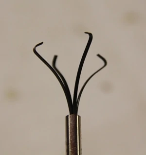 A prong retrieval tool has a flexible shaft to snake inside the pipes.