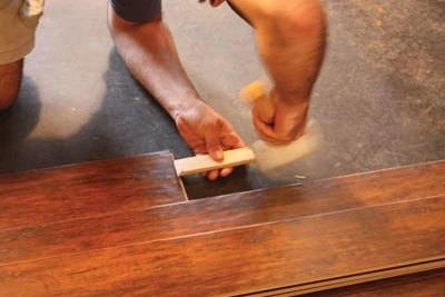 A mallet and wood block can be used to lock the end joints together.