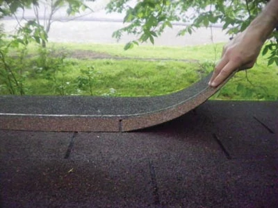 Whether you're applying a first layer of shingles or a second, asphalt roofing always begins with a starter strip.