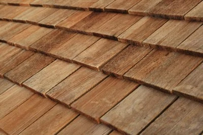 No need to fake it here: Genuine cedar shake or shingle roofing offers that signature classic look and long-term weather protection.